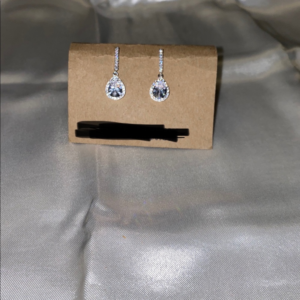 Brand new rhodium and crystal earrings